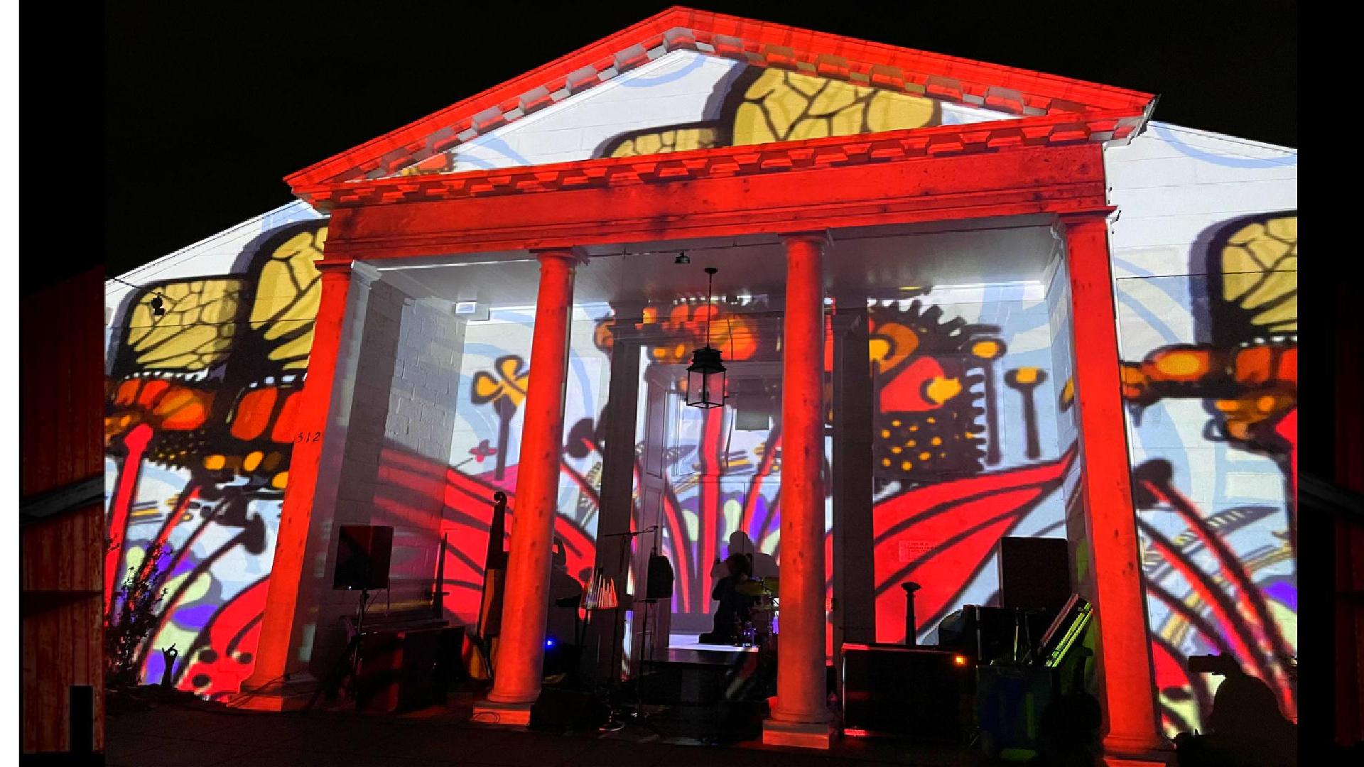 Butterfly projection mapping on a Greek revival museum building